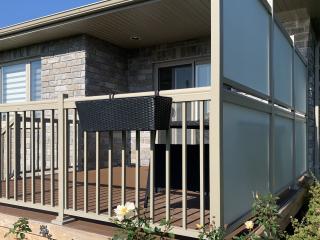 White railings on a deck