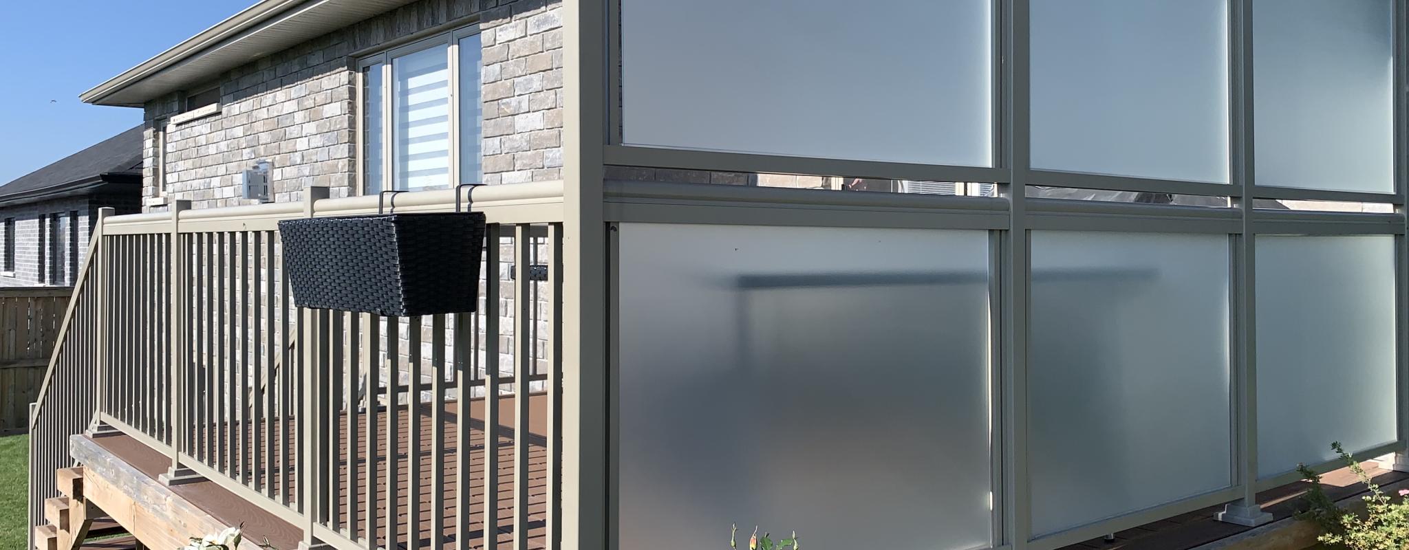 Aluminum railings and frosted privacy panels